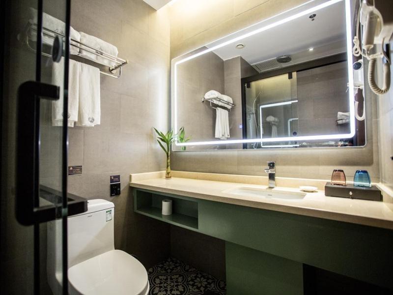 Gemei Hotel Luoyang Longmen High-Speed Railway Station Bagian luar foto