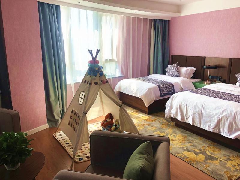 Gemei Hotel Luoyang Longmen High-Speed Railway Station Bagian luar foto