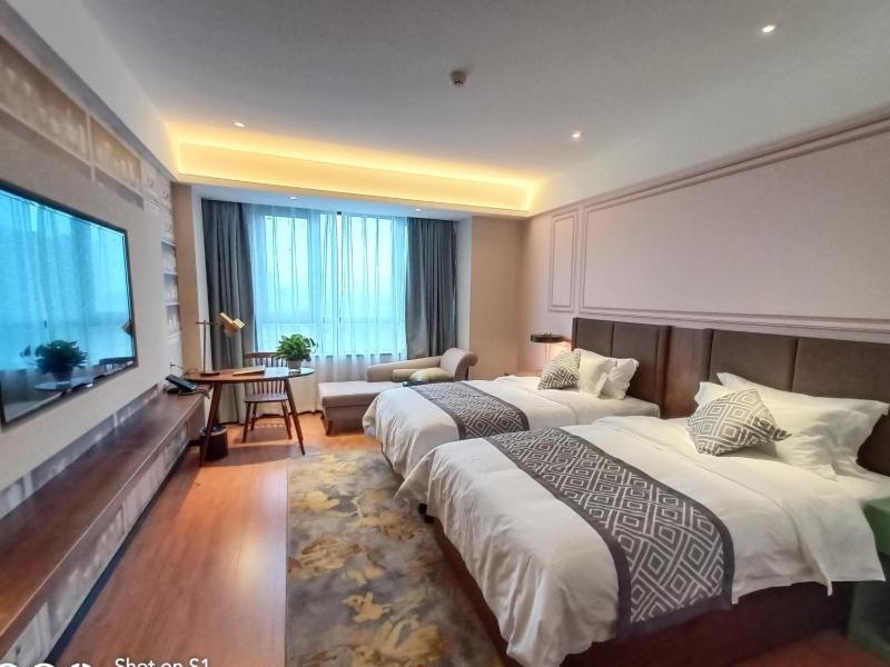 Gemei Hotel Luoyang Longmen High-Speed Railway Station Bagian luar foto
